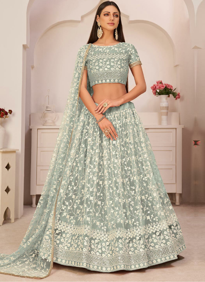 Pista Green Colour Net Wedding Lehenga.